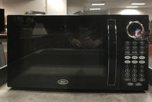 Load image into Gallery viewer, Countertop Oster black microwave (12x21x14)
