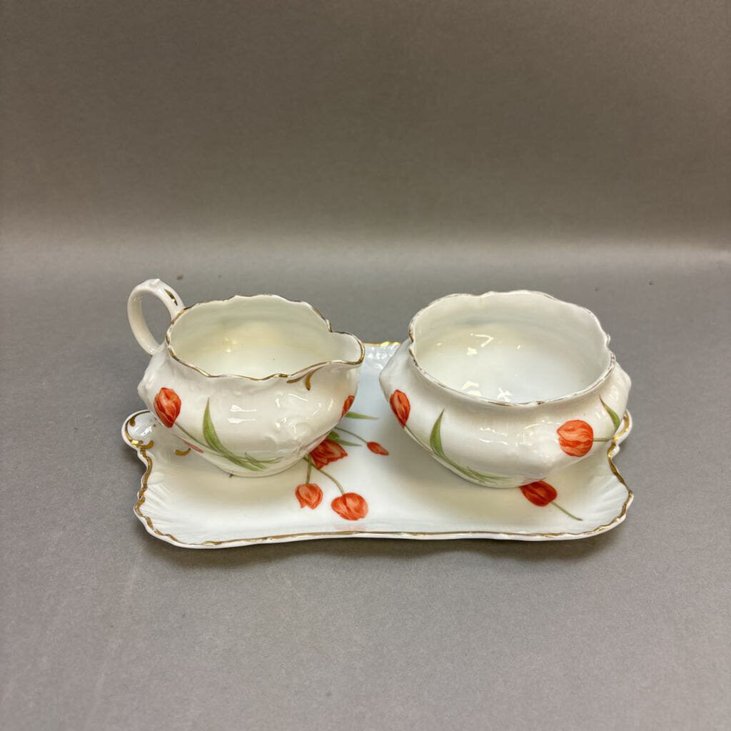 Vintage sugar and store creamer dishes