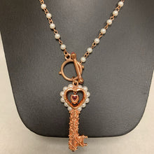 Load image into Gallery viewer, Marie Osmond Copper Faux Pearl Pink Crystal Key Toggle Necklace (32&quot;)
