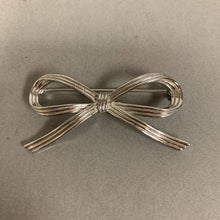 Load image into Gallery viewer, Vintage Trifari Silvertone Bow Brooch &amp; Clip Earrings Set
