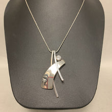 Load image into Gallery viewer, Howard's SIlvertone Cubic Zirconia Modern Pendant on 20" Chain

