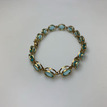 Load image into Gallery viewer, 14K Gold Oval Aqua Crystal 6.5&quot; Tennis Bracelet (6.4g)
