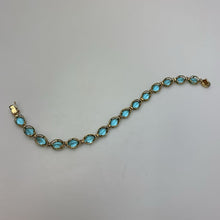 Load image into Gallery viewer, 14K Gold Oval Aqua Crystal 6.5" Tennis Bracelet (6.4g)
