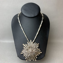 Load image into Gallery viewer, Vintage MCM Monet Starburst 3&quot; Pendant Brooch on 24&quot; Silvertone Beaded Necklace
