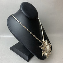 Load image into Gallery viewer, Vintage MCM Monet Starburst 3&quot; Pendant Brooch on 24&quot; Silvertone Beaded Necklace
