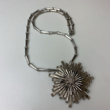 Load image into Gallery viewer, Vintage MCM Monet Starburst 3&quot; Pendant Brooch on 24&quot; Silvertone Beaded Necklace
