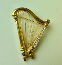 Load image into Gallery viewer, Vintage Monet Goldtone Swarovski Crystal Rhinestone Harp Brooch Pin (2")
