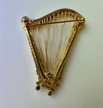 Load image into Gallery viewer, Vintage Monet Goldtone Swarovski Crystal Rhinestone Harp Brooch Pin (2")
