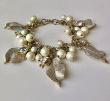 Load image into Gallery viewer, Vintage Goldtone Faux Pearl Aurora Borealis Rhinestone Leaf Charm Bracelet (7")
