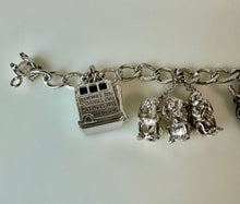 Load image into Gallery viewer, Vintage Wells Sterling Souvenir Charm 7.25" Bracelet w/ 8 Charms (38.9g)
