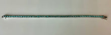 Load image into Gallery viewer, Rhodium Plated Simulated Blue Topaz Tennis Bracelet (7.5")
