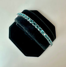 Load image into Gallery viewer, Rhodium Plated Simulated Blue Topaz Tennis Bracelet (7.5")
