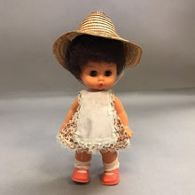 Load image into Gallery viewer, Plastic Doll in Straw Hat (10")
