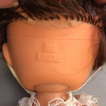 Load image into Gallery viewer, Plastic Doll in Straw Hat (10")
