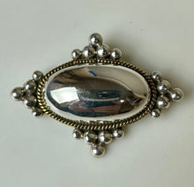 Load image into Gallery viewer, Vintage Mexican Sterling Domed Oval Brass Rope Detail Pendant Brooch Pin Signed (2.5")
