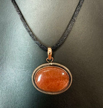 Load image into Gallery viewer, Copper Botswana Fire Agate 1.5" Pendant on Black Satin Cord Necklace
