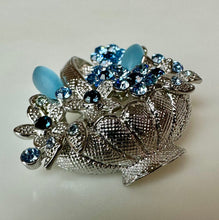Load image into Gallery viewer, Vintage Silvertone Blue Moonglow Rhinestone Flower Basket Brooch Pin (1.5")
