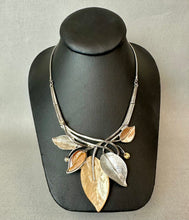 Load image into Gallery viewer, Pammy J Tan Enameled Resin Rhinestone Accent Silvertone Leafy Statement Necklace &amp; Earrings Set (19")
