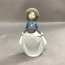Load image into Gallery viewer, Nao by Lladro Girl Holding Her Skirt Figurine (7")
