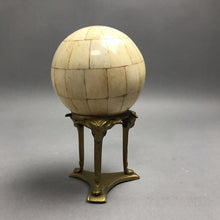 Load image into Gallery viewer, Vintage Brass Tripod Stand with Rams Holding Inlaid Bone Carpet Ball (7")
