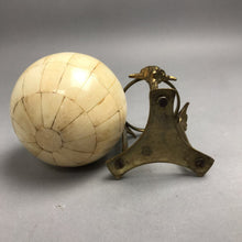 Load image into Gallery viewer, Vintage Brass Tripod Stand with Rams Holding Inlaid Bone Carpet Ball (7")

