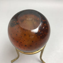 Load image into Gallery viewer, Vintage Glass Art Amber Paperweight with Bubbles on Stand (8")
