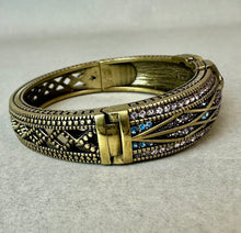Load image into Gallery viewer, Heidi Daus Tapered X Bronze Blue &amp; Pink Crystal Hinged Bangle Bracelet (7.5" Inside Circumference)
