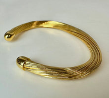 Load image into Gallery viewer, Vintage Goldtone Flexible Twisted Cable Cuff Bracelet (7" Inside Circumference)
