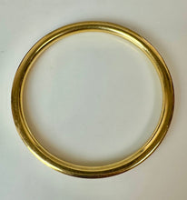 Load image into Gallery viewer, Goldtone Channel Set Cubic Zirconia Rounded Bangle Bracelet (8" Inside Circumference)
