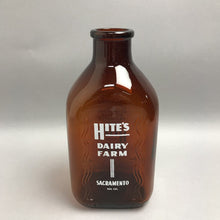 Load image into Gallery viewer, Vintage Hite's Dairy Amber Glass Milk Bottle (10")
