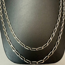 Load image into Gallery viewer, Vintage Monet Silvertone Twisted Paperclip Chain Necklace (54")
