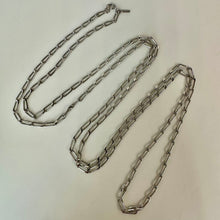 Load image into Gallery viewer, Vintage Monet Silvertone Twisted Paperclip Chain Necklace (54")
