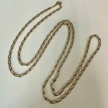 Load image into Gallery viewer, Vintage Monet Goldtone Twisted Paperclip Chain Necklace (48")
