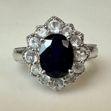 Load image into Gallery viewer, Sterling Dark Blue Topaz White Topaz Halo Ring sz 7
