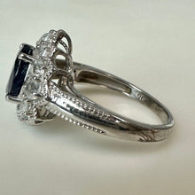 Load image into Gallery viewer, Sterling Dark Blue Topaz White Topaz Halo Ring sz 7

