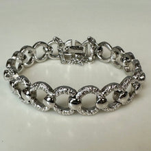 Load image into Gallery viewer, Vintage Monet Silvertone Textured O-Link Bracelet (6.75")
