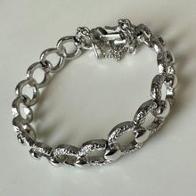 Load image into Gallery viewer, Vintage Monet Silvertone Textured O-Link Bracelet (6.75")
