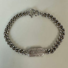 Load image into Gallery viewer, Vintage Crown Trifari Silvertone Astrology Taurus ID Bracelet (7")
