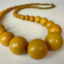 Load image into Gallery viewer, Vintage Butterscotch Egg Yolk Bakelite Graduated Bead Necklace (23")
