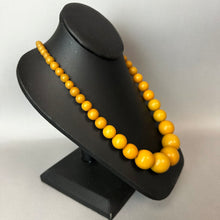 Load image into Gallery viewer, Vintage Butterscotch Egg Yolk Bakelite Graduated Bead Necklace (23")
