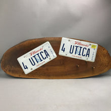 Load image into Gallery viewer, Wooden Slab Wall Plaque w/ Hooks; Utica, IL License Plates (37x14)
