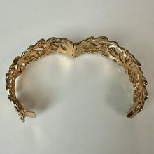 Load image into Gallery viewer, Vintage Goldtone Art Nouvea Style Floral Leaf Cutout Hinged Cuff Bracelet (7.5" Inside Circumference)

