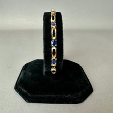 Load image into Gallery viewer, 14K Gold Blue Topaz Diamond 7.5" Tennis Bracelet (12.6g)
