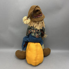 Load image into Gallery viewer, Scarecrow Sitting on Pumpkin Plush Decor (18")
