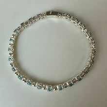 Load image into Gallery viewer, Sterling Blue Topaz Tennis Bracelet (8")
