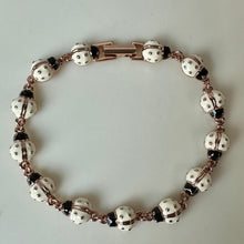 Load image into Gallery viewer, Vintage Joan Rivers Rose Gold White Enamel Ladybug Bracelet (7.75")
