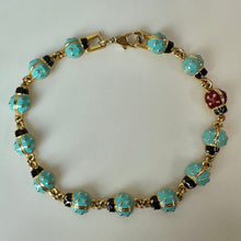 Load image into Gallery viewer, Vintage Joan Rivers Goldtone Turquoise Red Enamel Ladybug Bracelet (7.75")
