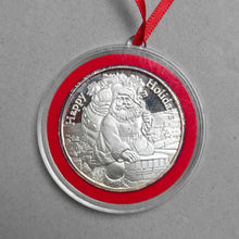 Load image into Gallery viewer, 1 Ozt. .999 Silver Round Christmas Ornament; Santa/Happy Holidays (~2")
