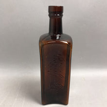 Load image into Gallery viewer, Antique W &amp; A Gilbey Amber Glass Spirit Bottle (9")
