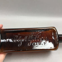 Load image into Gallery viewer, Antique W &amp; A Gilbey Amber Glass Spirit Bottle (9")
